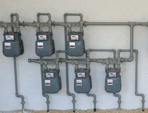 Metered gas distribution systems eliminate the need for individual propane tanks by each person's home.
